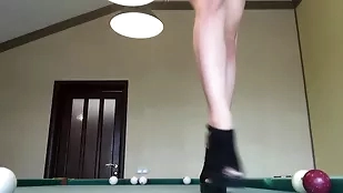 A stunning billiards player in an intense 720p video