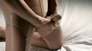 Fetish foot play with strapless dildo for an intense climax